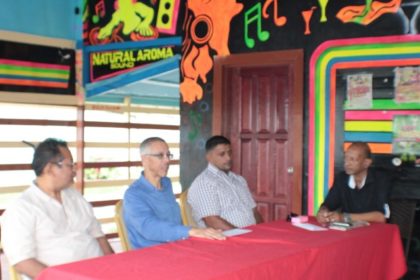 (From left to right) Minister of Business Dominic Gaskin (second from left) with Vice- Chairman of West Berbice Chamber of Commerce, Angad Ganesh and members of the Chamber of Commerce. 