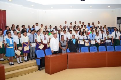 Minister of Indigenous Peoples’ Affairs Sydney Allicock with the graduting students of the 2016 batch of Hinterland Scholarship Programme