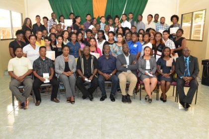 Technical Facilitator to the Minister of Education, Mr. Vincent Alexander and Presidential Advisor on Youth Empowerment, Mr. Aubrey Norton with facilitators and participants at the graduation ceremony of the second of eight  Youth Leadership Training programmes. 