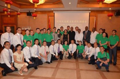 The outgoing Chinese Medical Brigade and their successors (in green shirts) with second row-fourth from right: Minister of Finance, Mr. Winston Jordan, Minister of State, Mr. Joseph Harmon, Prime Minister, Mr. Moses Nagamootoo, President David Granger, First Lady, Mrs. Sandra Granger, wife of the Chinese Ambassador to Guyana, Ms. Liu Yu and Chinese Ambassador to Guyana, Mr. Zhang Limin