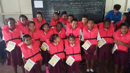Primary and secondary students of Hururu School receiving life jackets as a collaborative effort between MARAD and Oldendorff