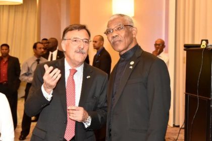 Ambassador Martino makes a point to President Granger during the Embassy's reception held at the Marriott Hotel, earlier this evening.