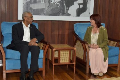 President David Granger shares a light moment with Ms. Perceval, during their meeting at the Ministry of the Presidency today.