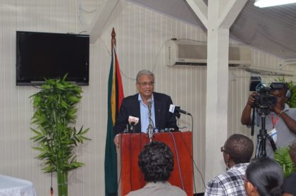 Minister of Education Dr. Rupert Roopnaraine addressing the media