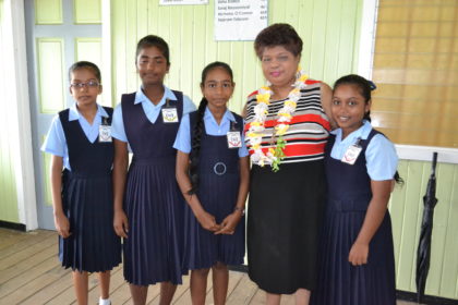 These Blairmont Primary School pupils were eager to meet Minister of Social Cohesion, Ms. Amna Ally. Top NGSA student, Ms. Sandyah Ramoo is pictured third from left