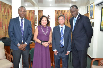First Lady, Mrs. Sandra Granger is flanked by, from L-R : Mr. Dion Inniss, Caribbean Airlines' Guyana and Suriname Sales Representative; Mr. Tyrone Tang, Chief Executive Officer and Mr. Carl Stuart, South America Manager