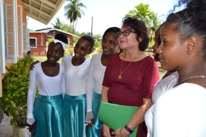 First Lady, Mrs. Sandra Granger delighted some members of the Tabernacle Moravian youth dance troupe when she agreed to pose for a photograph with them.