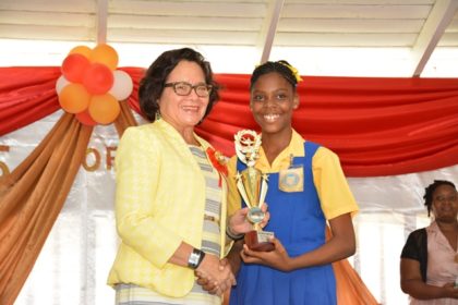 First Lady, Mrs. Sandra Granger presented the Most Outstanding Graduate Award to Ms. Jada Leitch