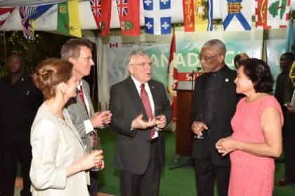 President David Granger and First Lady, Mrs. Sandra Granger in conversation with Canadian High Commissioner Mr. Pierre Giroux (at centre) and his wife Mrs. Blanca Giroux and Head of Aid, Mr. Daniel Joly on the occasion of Canada Day.