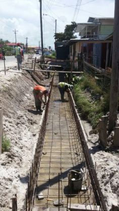 Contractors working on the West Coast Demerara road