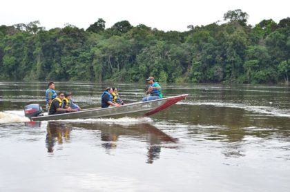 Prime Minister Moses Nagamootoo and VP Sydney Allicock and team on a survey trip on the Essequibo river in the vicinity of the Kurupukari crossing.