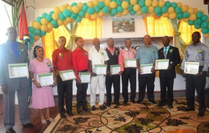 The first place winners of GuySuCo's Honour Roll Awards for outstanding work in 2015