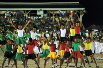 Students performing at Guyana’s 50th anniversary celebrations at D’urban Park