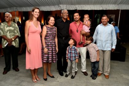 President David Granger and First Lady Mrs. Sandra Granger with Toshao Lenox Shuman and his family. Minister of Indigenous Peoples' Affairs, Mr. Sydney Allicock is at right 