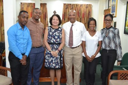 First Lady, Mrs. Sandra Granger is flanked by, from left to right, Mr. Ashley Bailey, Mr. Cecil Maxwell, Mr. Andrew Boyle, Ms. Sheena McLean and Ms. Laurel Dundas, at State House.