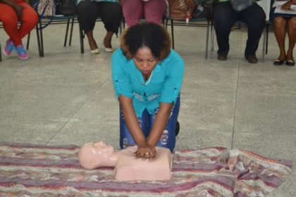 One of the participants, demonstrating basic Cardiopulmonary Resuscitation (CPR).
