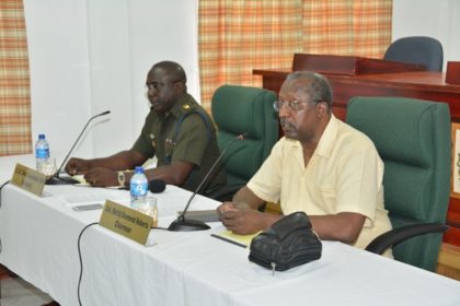 Chairman of the Commission, Col. (Ret’d) Desmond Roberts and Secretary to the Commission, Col. Denzil Carmichael during the press conference at the Department of Public Service 