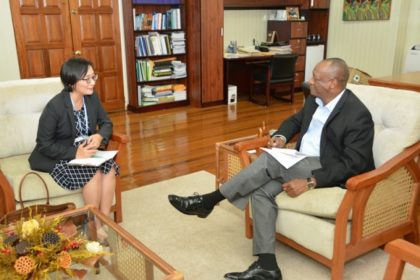 Minister of State, Mr. Joseph Harmon engaging the new United Nations Development Programme (UNDP) Resident Representative in Guyana, Ms. Mikiko Tanaka at the Ministry of the Presidency, earlier this afternoon.