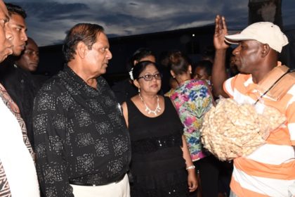 Prime Minister Moses Nagamootoo and Mrs. Sita Nagamootoo listen to the concerns of a Linden resident 