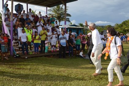 President David Granger greeting members of the Paruima team as he and First Lady Sandra Granger were about to return to Georgetown after the official opening of the Upper Mazaruni 19th Annual District Games at Kamarang, Cuyuni Mazaruni.