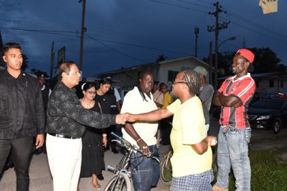 Prime Minister Moses Nagamootoo greets Linden residents during his walkabout