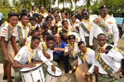 President David Granger is all smiles as he strikes a pose with a group of Seventh Day Adventist Pathfinders, who participated in the Inter-Denominational Independence and Emancipation Service, during his visit to the Den Amstel Ebenezer Congregational Church, earlier today.