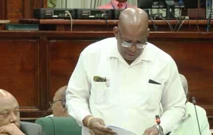 Finance Minister Winston Jordan moving the petroleum order in Parliament