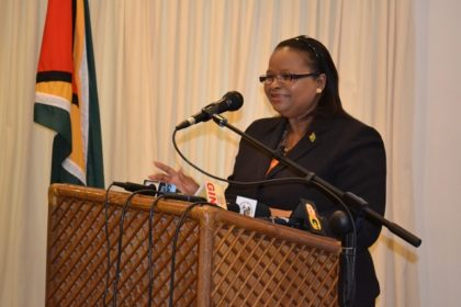 Minister of Social Protection, Ms. Volda Lawrence delivering her address to the at the Reporting handing over ceremony.