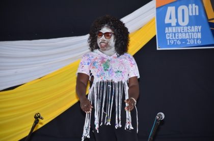 A teacher from the Ascension Nursery School perform a poem, titled “Cocaine” at the concert