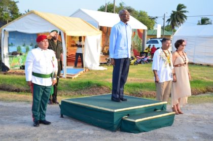 President David Granger along with Minister of Indigenous Peoples Affairs Sydney Allicock and Minister within the Ministry of Indigenous Peoples Affairs Valerie Garrido-Lowe taking the salute at the launch of Indigenous Heritage Month at the Heritage Village, Sophia Complex