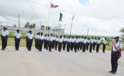 Graduate Prison Officers on the drill square at the Cecil Kilkenny Prison Officers’ Training School, Lusignan 