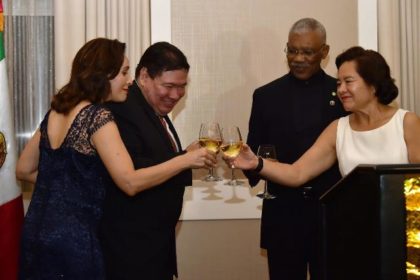 President David Granger and First Lady, Mrs. Sandra Granger share a light moment with the Mexican Ambassador to Guyana, His Excellency, Ivan Roberto Sierra-Medel and his wife, Ms. Norma Alizia de la Torre Diaz.