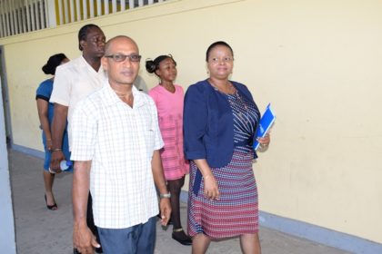 Minister of Social Protection, Volda Lawrence having a walk through at the Skeldon High School led by HM Chandradeo Mahadeo
