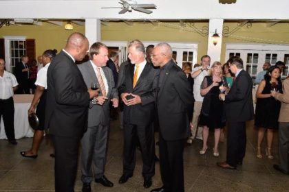 From left- Minister of State, Mr. Joseph Harmon, Germany’s Regional Director for Latin America and the Caribbean, Ambassador Dieter Lamle, Germany’s Ambassador to Guyana, Mr. Lutz Hermann Gorgens and President David Granger in discussion during the reception.