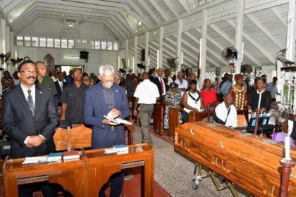 President David Granger and Minister of Legal Affairs, Mr. Basil Williams during the funeral service  