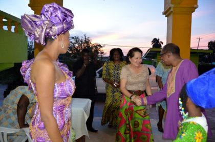 Mr. Eric Phillips welcomes First Lady, Mrs. Sandra Granger to the Sikukuu ya-Mwaka, earlier this evening at the Akwaaba Centre, Thomas Lands as Mistress of Ceremonies, Ms Shabakie Fernandes (first left) and Ms. Trovina Ellis (first, right) look on.