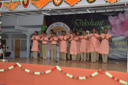 Students of the Saraswati Vidya Niketan (SVN) Hindu School reciting a chant 
