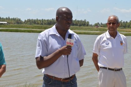 Permanent Secretary of the Ministry of Agriculture George Jarvis and Aquaculture farm owner, Jeffrey Fraser.