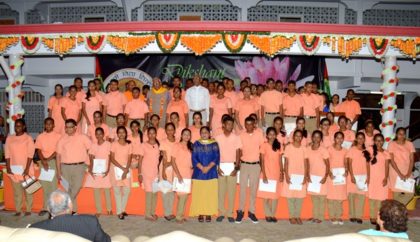 President David Granger, Professor Clement Sankat (on stage) and Mrs. Sita Nagamootoo (standing below) with SVN's graduating class of 2016