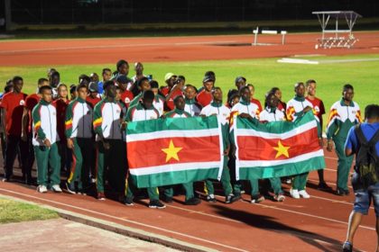 Athletes representing Suriname during their March pass