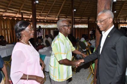 President Granger shares a light moment with these two residents from the Upper Demerara-Berbice (Region Ten) who were treated today at the Umana Yana.