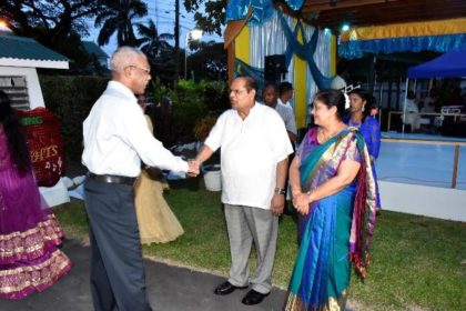President David Granger is greeted and welcomed to the event by Prime Minister Moses Nagamootoo and Mrs. Sita Nagamootoo. 