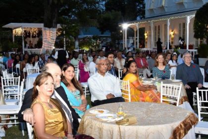 President David Granger, Ms. Angela Nagamootoo (left), daughter of Prime Minister Moses Nagamootoo and the United States Ambassador to Guyana, Mr. Perry Holloway and Mrs. Holloway enjoying the programme at the Prime Minister's residence.