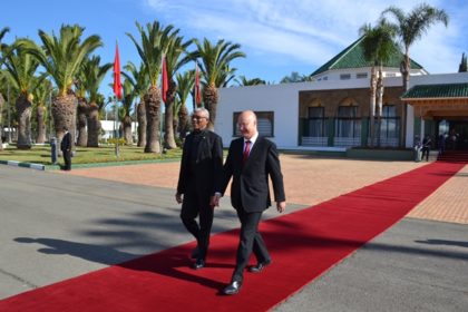 President David Granger being escorted to board the aircraft at the with at the Mohammed V International Airport in Casablanca for the final leg of his journey to Marrakesh by Mr. Anis Birou, Minister of Moroccan Community Abroad and Immigration affairs, who had earlier officially welcomed him to Morocco.