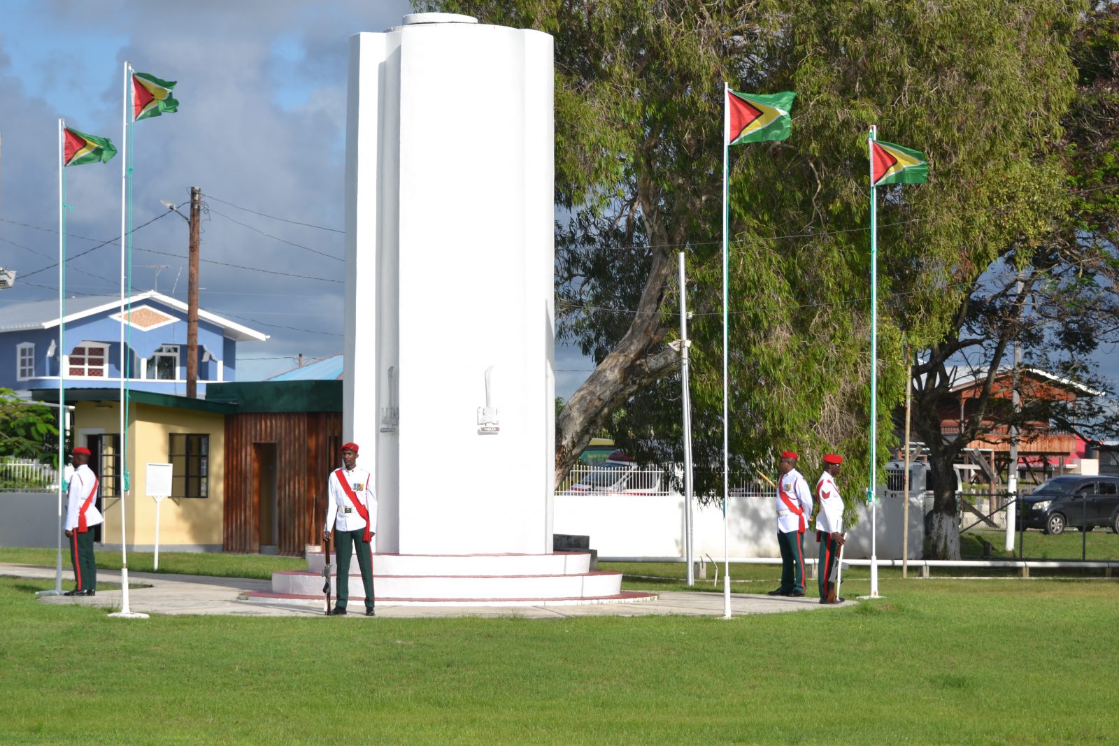 Min Scott and others celebrate the sacrifice of Enmore Five DPI Guyana